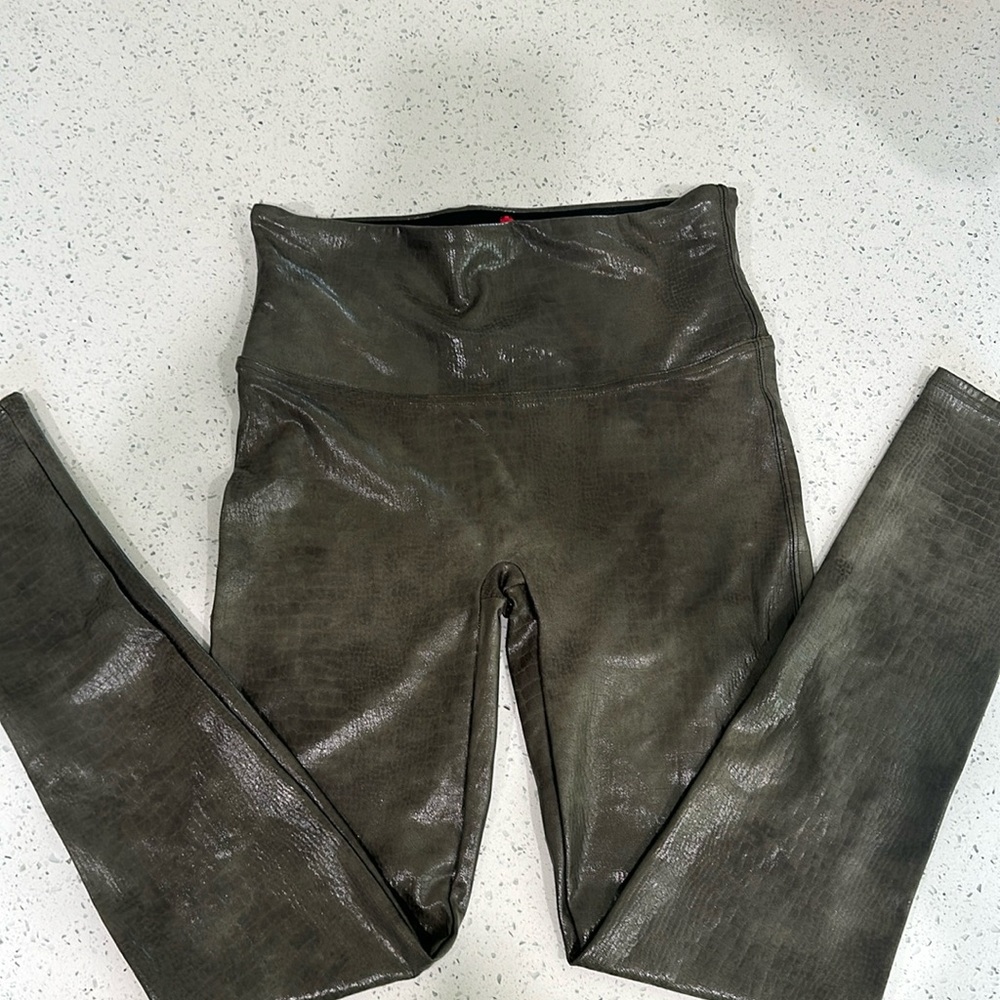 Spank faux leather green leggings.